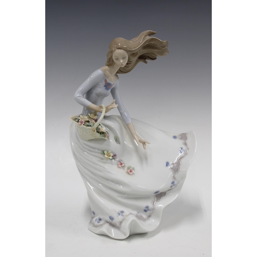 386 - Lladro Petals in the wind porcelain figure, 30cm