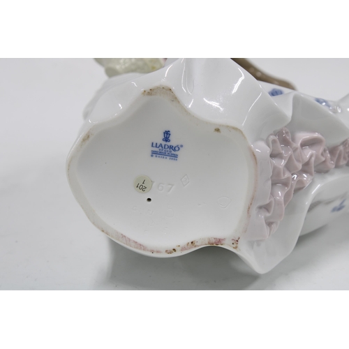 386 - Lladro Petals in the wind porcelain figure, 30cm