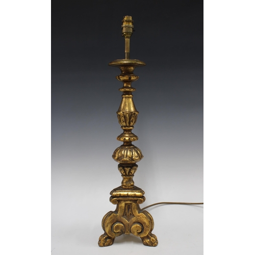 391 - Baroque style gilt table lamp on paw feet, 60cm