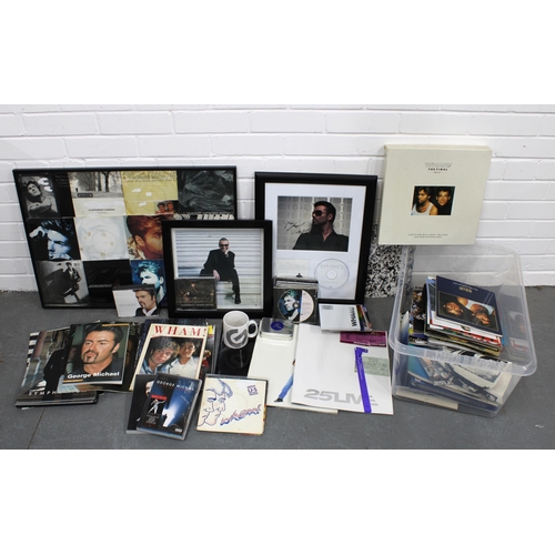 412 - Large collection of George Michael memorabilia in two boxes, including a framed signed Patience  pho... 