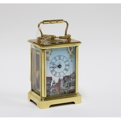 433 - Halcyon Days brass and glass cased carriage clock, with an enamel dial, 14cm including handle