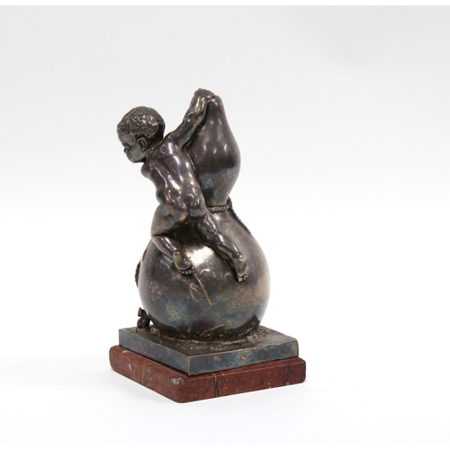 434 - AFTER LOUIS KLEY ( 1833 - 1911) A French silvered bronze cupid and gourd figure group, on a red hard... 