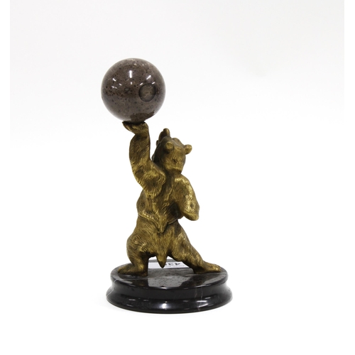 435 - Bronze bear, likely Russian, modelled standing  with one paw aloft holding a hardstone sphere, on a ... 