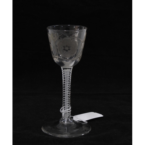 437 - An 18th century Jacobite enamel twist stem wine glass with engraved bowl, circular footrim with loss... 