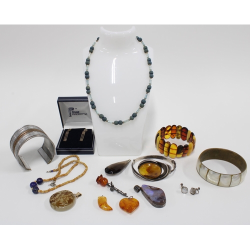 44 - Amber and hardstone jewellery to include moonstone earrings, silver earrings and bangles etc (a lot)