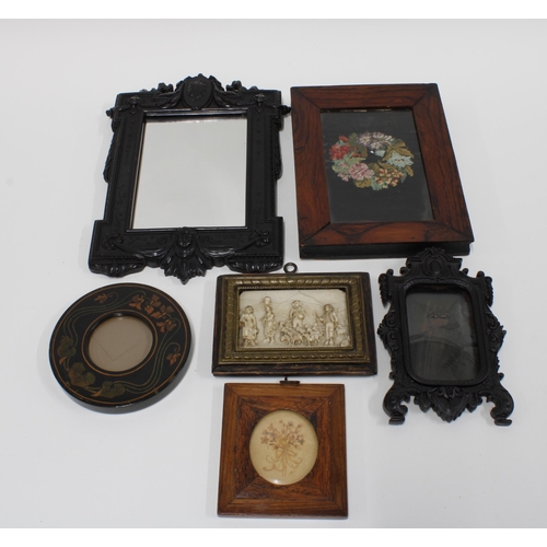 456 - A collection of frames to include rosewood, ebonised and dark oak, etc