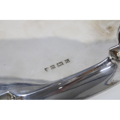 47 - Silver salver, square form with pie crust edge, on four scroll feet, Birmingham 1966, 19cm