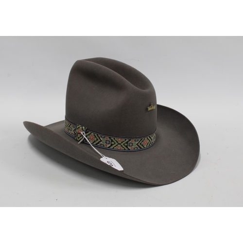 470 - COPPERMINE WESTERN Stetson, grey with ribbon band and a TEXAS badge, Size 7