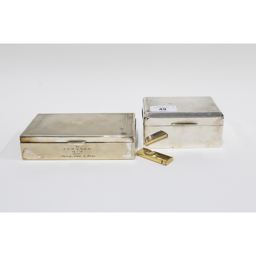 49 - George V silver cigarette box, Birmingham 1931 together with an Epns cigarette box and a cigar cutte... 