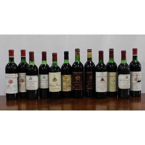 499 - Twelve various bottles of vintage red wine to include Chateaux Tuillac 1975,  Chateaux Muscat 1977, ... 