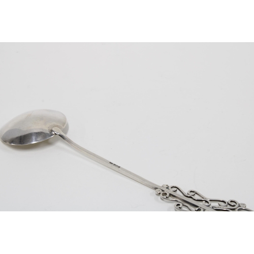 53 - Arts & Crafts silver spoon by Nellie Elizabeth Smyth, Edinburgh 1949, with long stem and pierced han... 