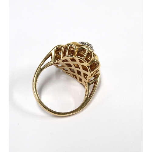 7 - 14ct gold and diamond cocktail dress ring with a flowerhead setting with a central cluster of 14 bri... 