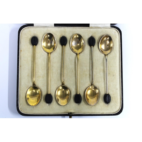 71 - Harlequin set of six enamel and gilt coffee spoons, in fitted case (6)