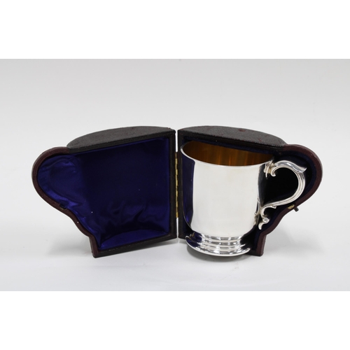 76 - Victorian silver gilt Christening mug by R & S Garrard & Co, London 1891, with its original leather ... 