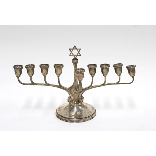 82 - Jewish Menorah silver candlestick, Birmingham 1956, 12cm high x 25cm long