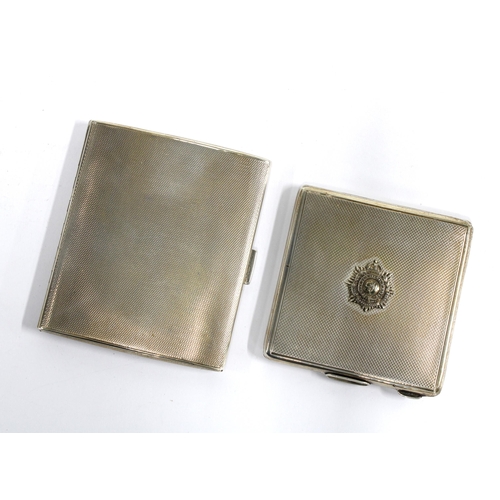 87 - George V silver cigarette case, London 1923 and a silver compact with Royal Army Corps emblem, (2)