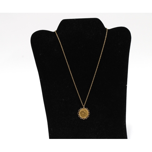 96 - Edward VII gold half sovereign, dated 1910, mounted in a 9ct gold pendant setting, on a 9 ct gold ch... 