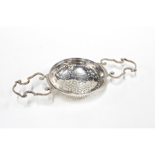 58 - George II silver fruit strainer bearing makers mark only for William Solomon of London, 20cm