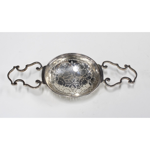 58 - George II silver fruit strainer bearing makers mark only for William Solomon of London, 20cm