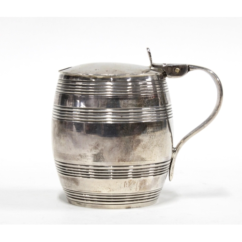 60 - George V silver mustard of barrel form, with blue glass liner, London 1913, 7cm high