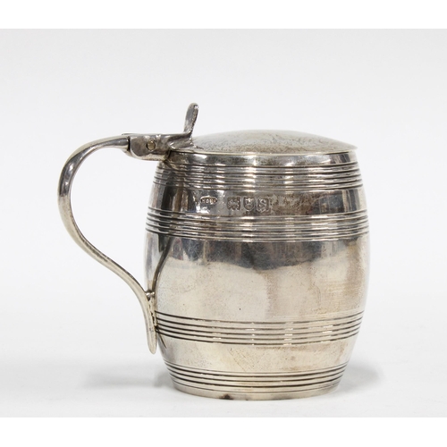 60 - George V silver mustard of barrel form, with blue glass liner, London 1913, 7cm high