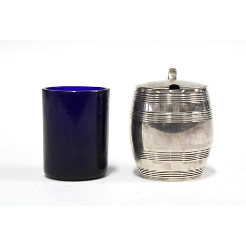 60 - George V silver mustard of barrel form, with blue glass liner, London 1913, 7cm high