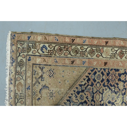 531 - Hamadan style runner, worn blue and red field with a foliate lozenge, within multiple borders,  306 ... 