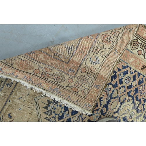 531 - Hamadan style runner, worn blue and red field with a foliate lozenge, within multiple borders,  306 ... 