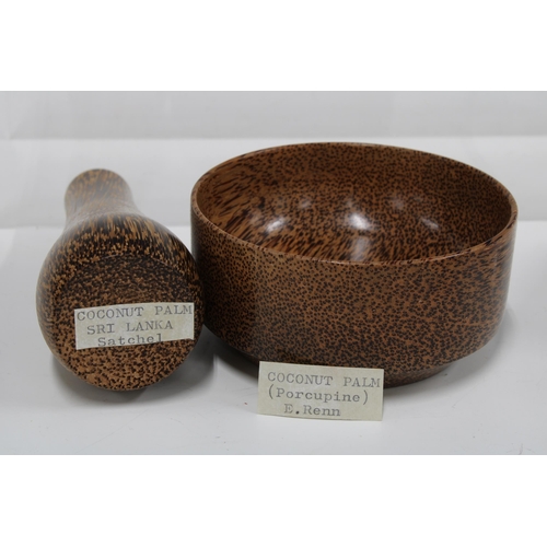 104 - A collection of artisan treen containers & vessels, woods include coconut palm, cocobolo & padauk, e... 