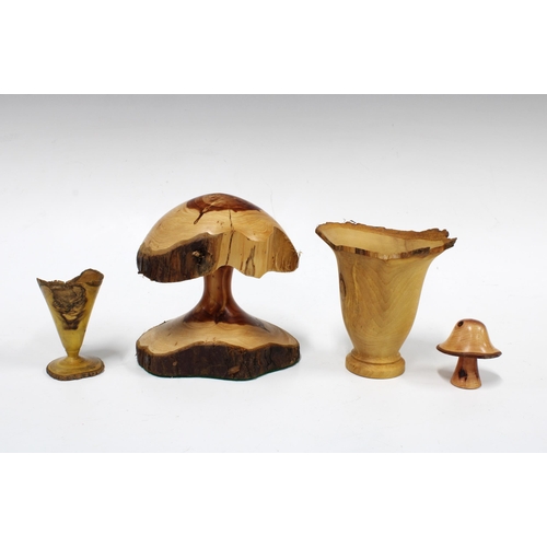 121 - Three Artisan designed wooden toadstools to include berberis, juniper and  cypress together with an ... 