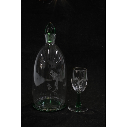 122 - Orrefors glass liqueur set, the clear glass decanter with green footrim and stopper,   and set of se... 