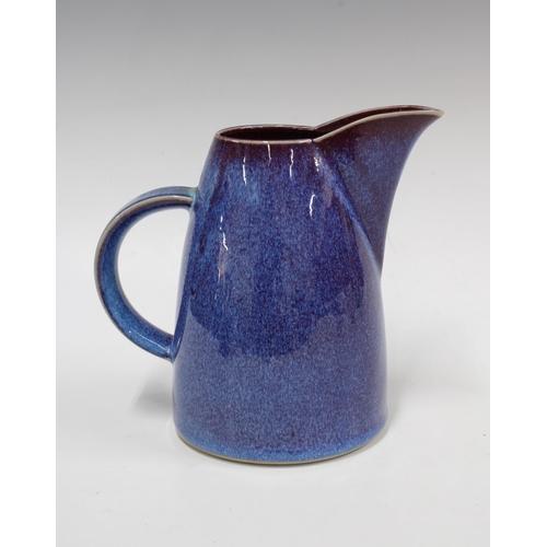 128 - Dart Pottery jug with purple hares-fur glaze, impressed mark, 22 x 18cm.