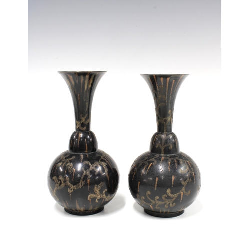 132 - A pair of WMF  (WURTTEMBERGISCHE METALLWARENFABRIK) metal vases, with lighthouse backstamp (2)  9 x ... 