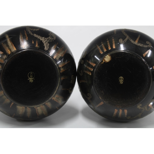 132 - A pair of WMF  (WURTTEMBERGISCHE METALLWARENFABRIK) metal vases, with lighthouse backstamp (2)  9 x ... 