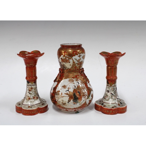 143 - Kutani double gourd porcelain vase an a pair of Kutan candlesticks, (3) 23.5cm high.