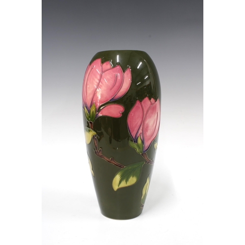 149 - WALTER MOORCROFT Magnolia pattern vase, olive ground 101/12, signed W.Moorcroft, 16 x 32cm.