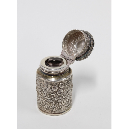 17 - George V silver scent bottle holder, Birmingham 1911, containing a  glass bottle and stopper,  7cm