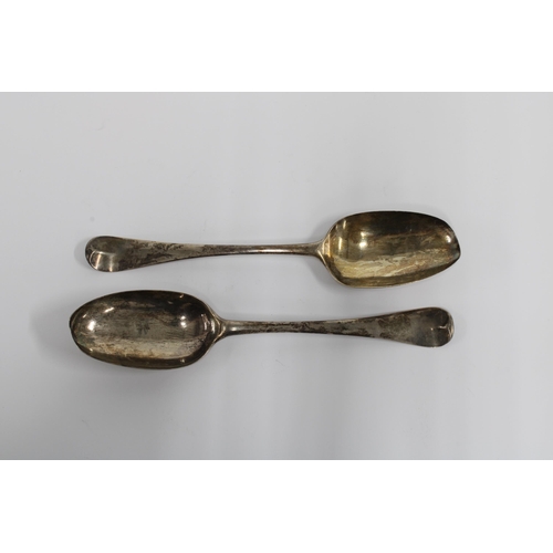 24 - A pair of 18th century silver spoons, hanoverian pattern with initialled handles and rat tail bowls,... 