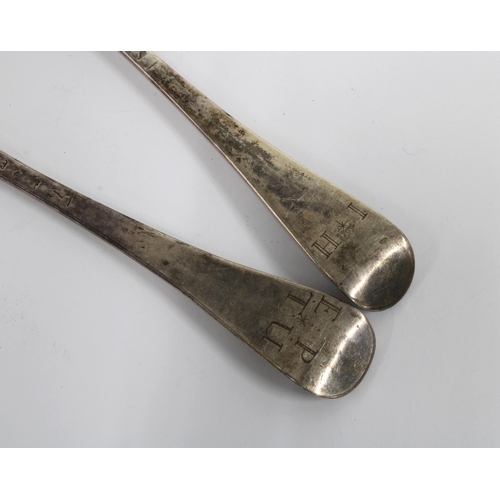 24 - A pair of 18th century silver spoons, hanoverian pattern with initialled handles and rat tail bowls,... 