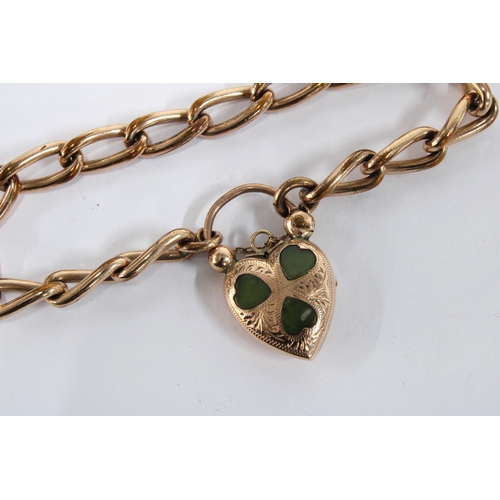 26 - Gold plated bracelet with a 9ct gold heart shaped padlock, inset with three jade leaf panels, Birmin... 