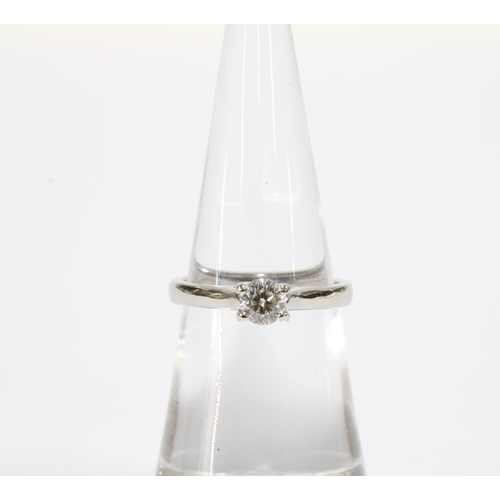 27 - 'The Leo' diamond solitaire ring, the circular stone with an approximate weight of 0.33ct, claw set ... 