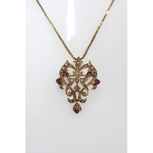 43 - 9ct gold ruby and seed pearl pendant on a later 9ct gold chain