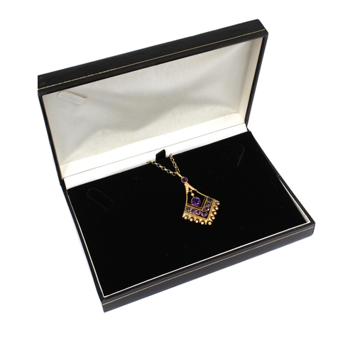 52 - 15ct gold gemset pendant on a 9ct gold chain