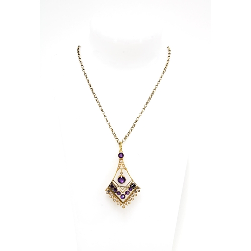 52 - 15ct gold gemset pendant on a 9ct gold chain