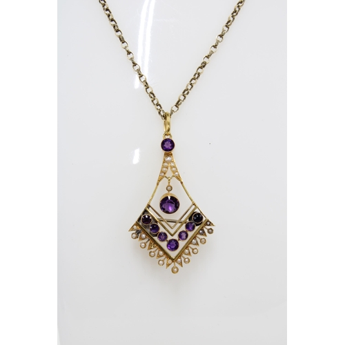 52 - 15ct gold gemset pendant on a 9ct gold chain