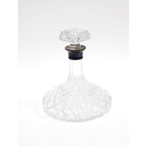 66 - Cut glass ships decanter with a silver collar, Birmingham 1962