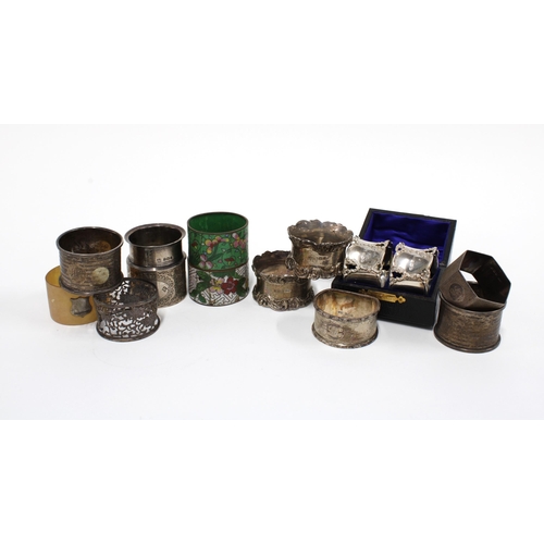 76 - Ten silver napkin rings with various hallmarks, a silver plated napkin ring, two cloisonne and one h... 