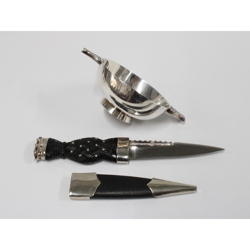 441 - Silver plated Scottish sigan dubh / skean dhu and a quaich with engraved armorial (2)