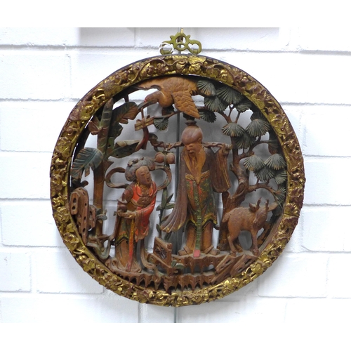 474 - Chinese circular pierced plaque with figures and a deer, painted with gilt border, 35cm