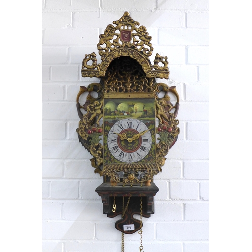 479 - Frisian wall clock, painted dial flanked by mermaids, complete with weights